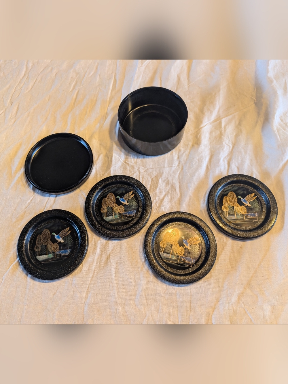 2/30$ Vintage Black and Gold Lacquered Coasters with Blue Bird Motif